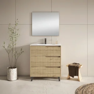 Mueble de baño Ezio con lavabo de porcelana y tres cajones con patas en negro, en madera, ambientado en baño