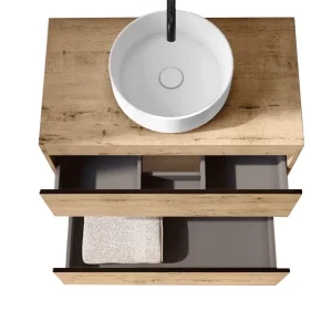 Conjunto de mueble de baño suspendido Saturno con dos cajones y lavabo sobre encimera, con cajón abierto en madera