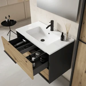 Mueble de baño suspendido Doly con lavabo de porcelana, con cajón abierto en madera