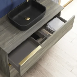 Conjunto de mueble de baño suspendido Plutón con tapa de melamina, con cajón abierto en gris