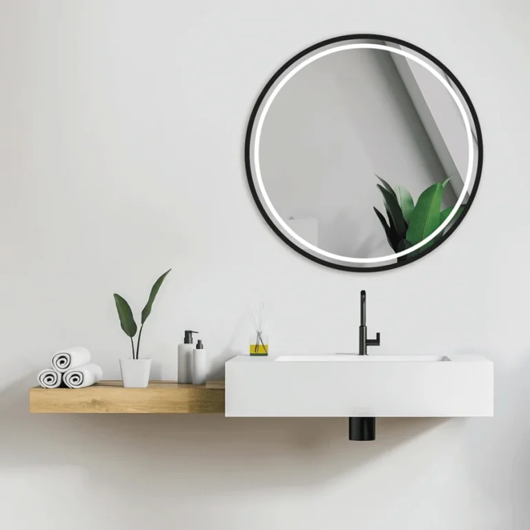 Espejo redondo LED en negro con luz Triled y anti-vaho, sobre lavabo con encimera de madera