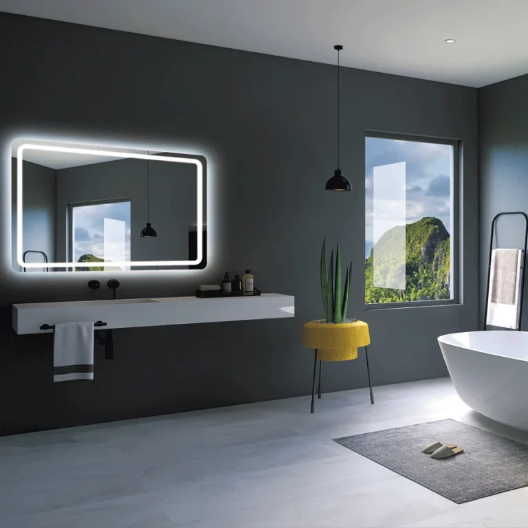 Espejo de baño Grecia cuadrado con cantos redondeados y luz LED frontal fría, ambientado en baño gris