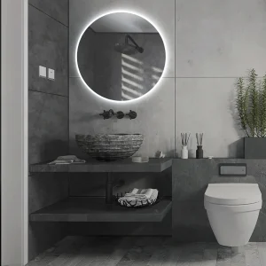 Espejo de baño Londres redondo con contorno arenado y luz LED fría, ambientado en baño