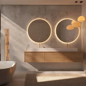 Espejo Fun redondo con iluminación LED y marco metálico, en dorado, ambientado en baño