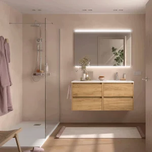 Mueble de baño de baño Noja 120 cm con 4 cajones y lavabo desplazado, en madera, ambientado en baño