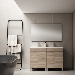 Mueble de baño Stephanie 120 cm con doble lavabo cerámico y 4 puertas, en madera clara con patas y espejo
