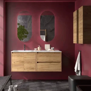 Mueble de baño Noja 120 cm con 2 cajones, 2 puertas y lavabo desplazado, en madera, ambientado en baño granate