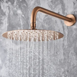 Conjunto de ducha empotrado monomando serie Olimpo de Imex, detalle del rociador en oro rosa