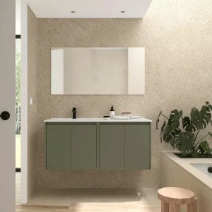 Conjunto de baño Noja 120 cm con 4 puertas, lavabo desplazado y espejo incluido, en verde, ambientado en baño