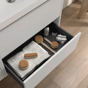 Mueble de baño suspendido Noja con 2 cajones y lavabo de porcelana, con cajón abierto en blanco