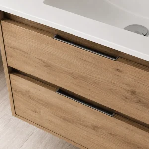 Mueble de baño Malta suspendido con lavabo de porcelana desplazado, detalle del acabado en madera